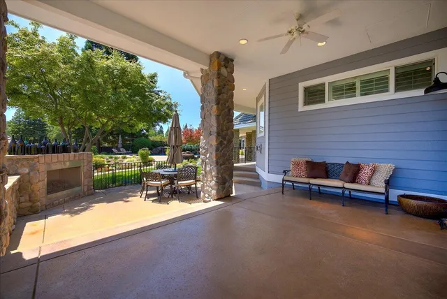 a view of a backyard with a patio