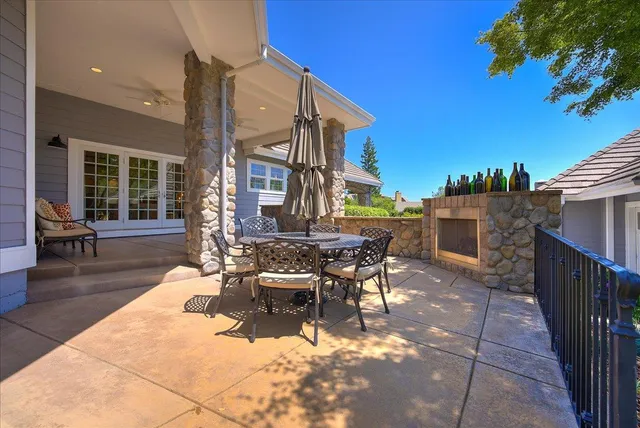a view of a swimming pool with a patio