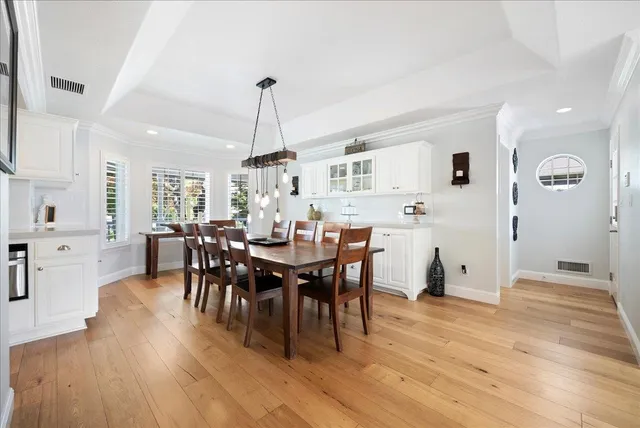 a view of a dining room with furniture