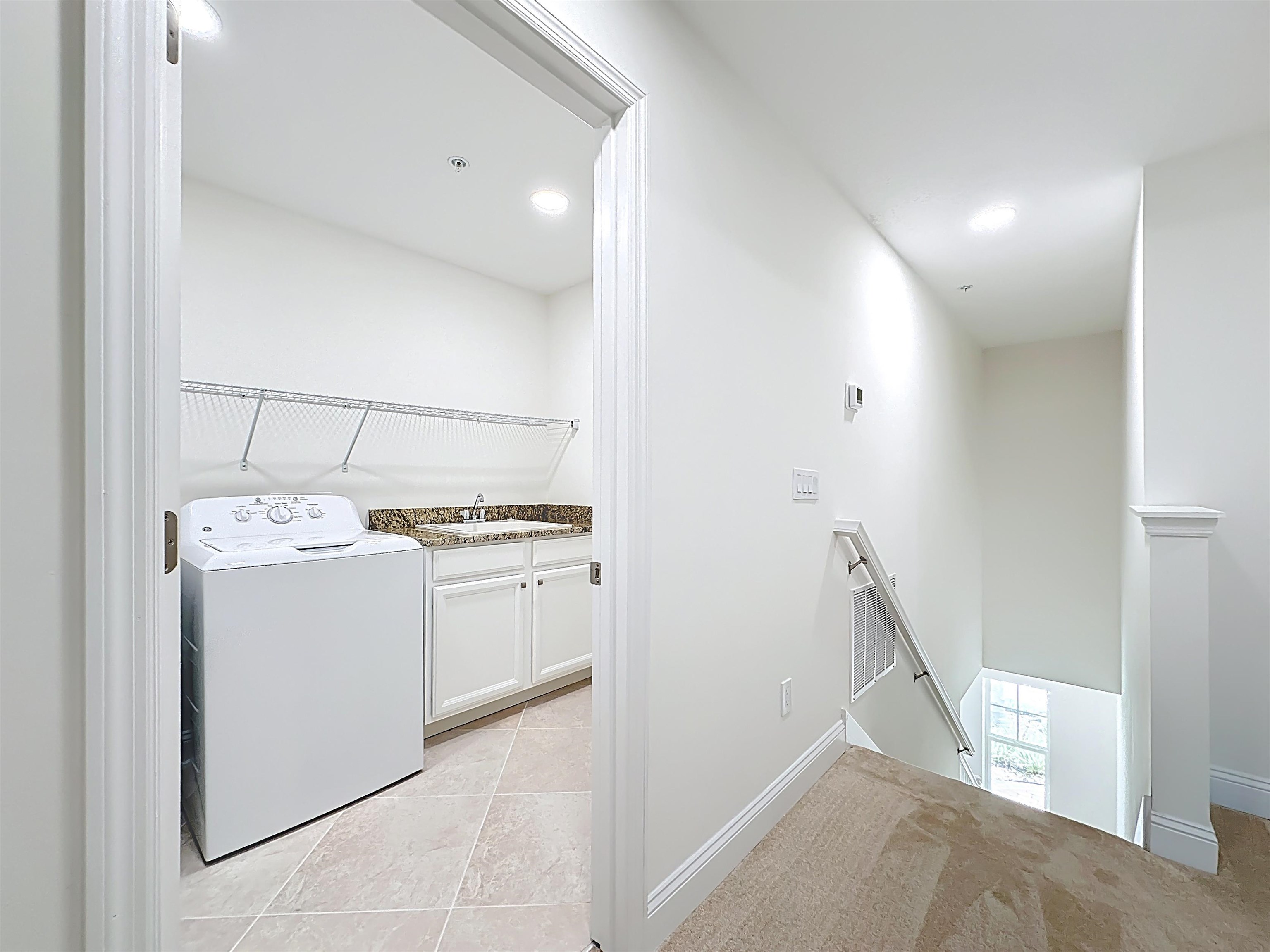 251 Grand Ravine Drive St. Augustine, FL 32086 - Photo 17 of 37 a utility room with dryer and washer