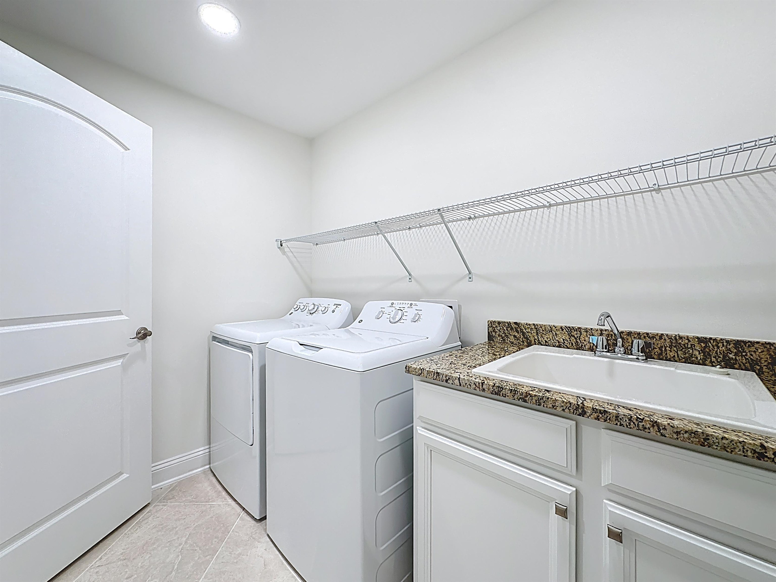 251 Grand Ravine Drive St. Augustine, FL 32086 - Photo 18 of 37 a utility room with dryer and washer