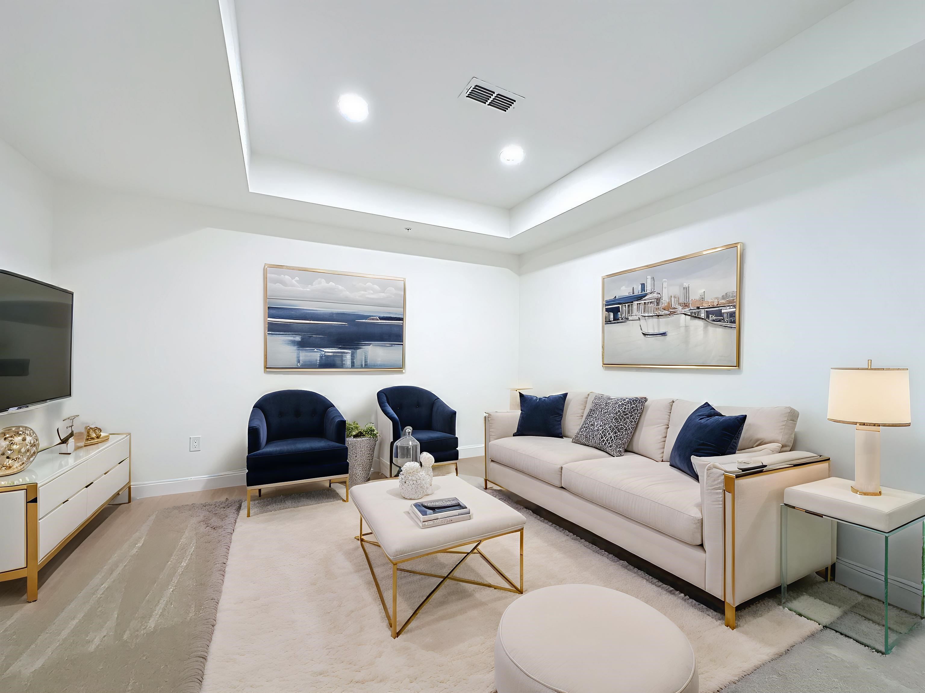 251 Grand Ravine Drive St. Augustine, FL 32086 - Photo 20 of 37 a living room with furniture a rug and white walls