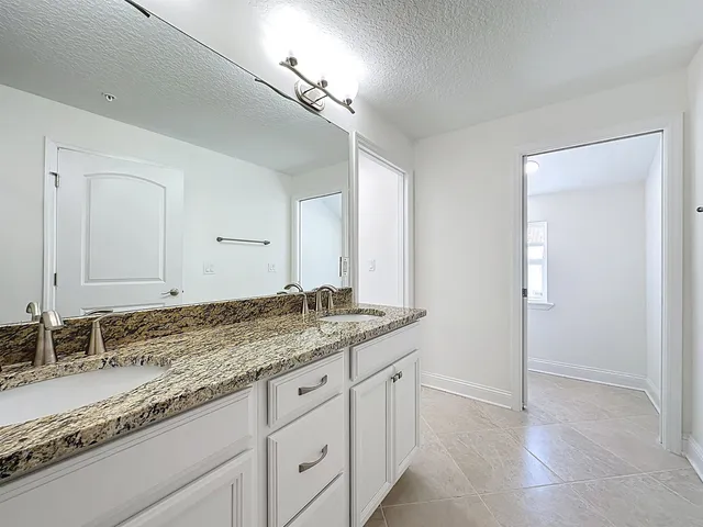 a aerial view of a house with a garden