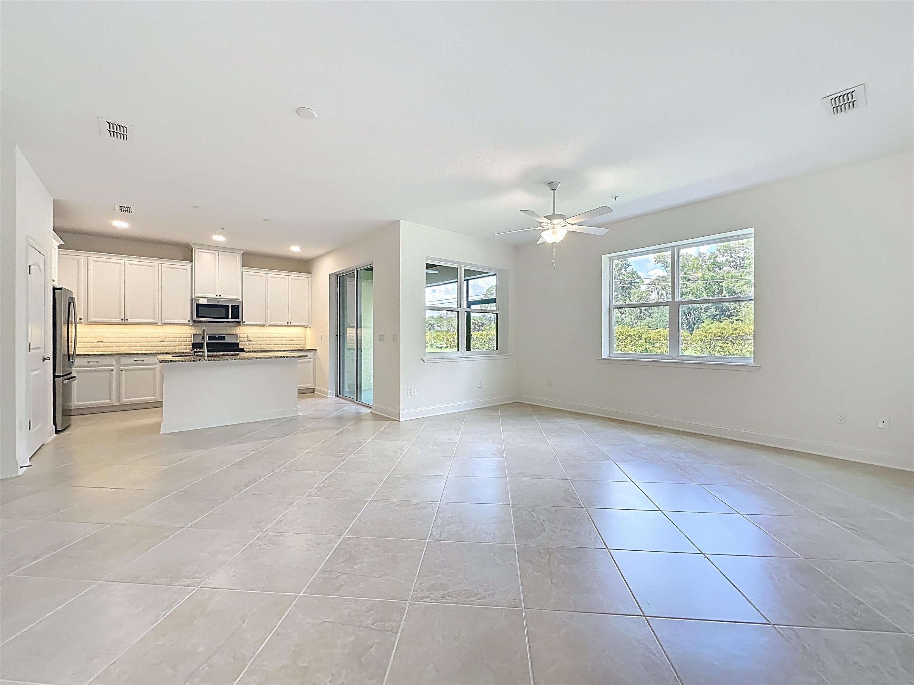 251 Grand Ravine Drive St. Augustine, FL 32086 - Photo 6 of 37 a view of a kitchen with furniture and a kitchen