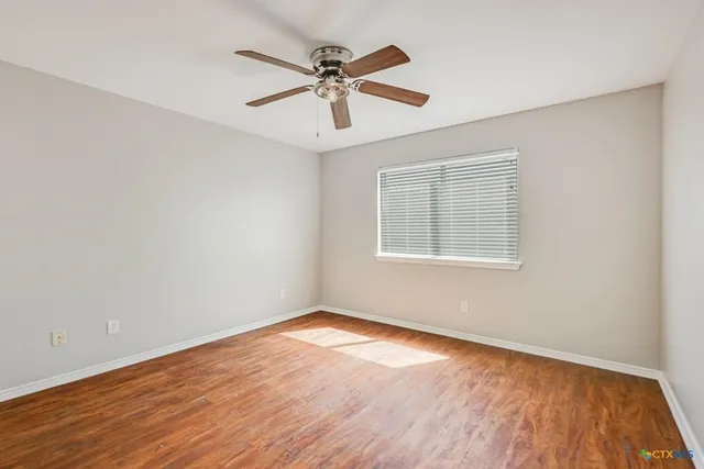 a view of balcony with furniture