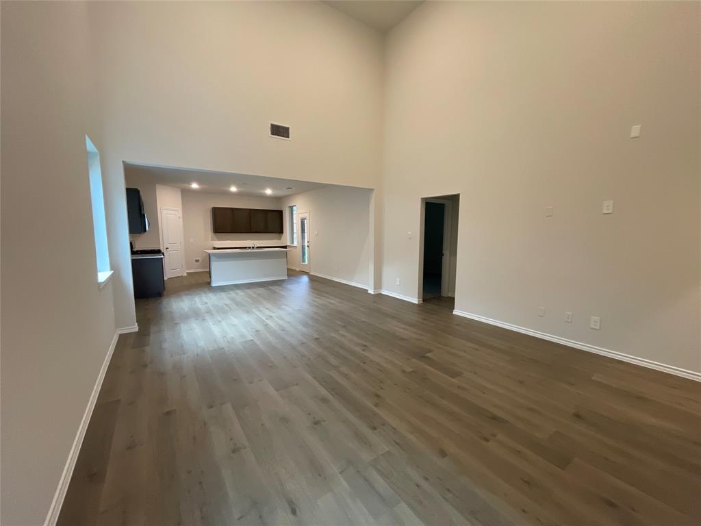 657 Chipper Trail Lavon, TX 75166 - Photo 8 of 24 a view of a livingroom with wooden floor