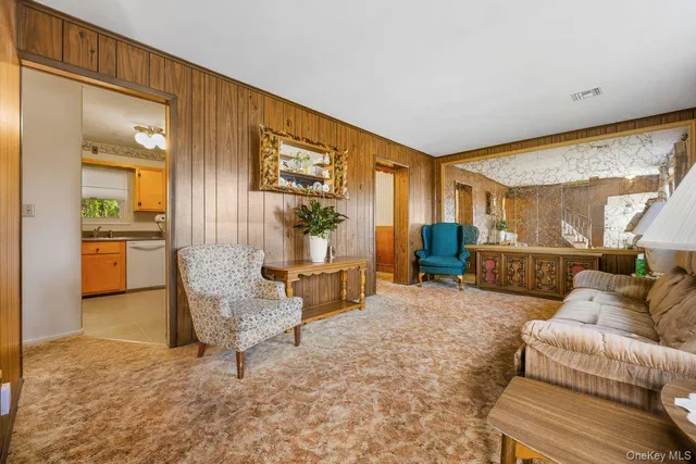 a living room with furniture and a table
