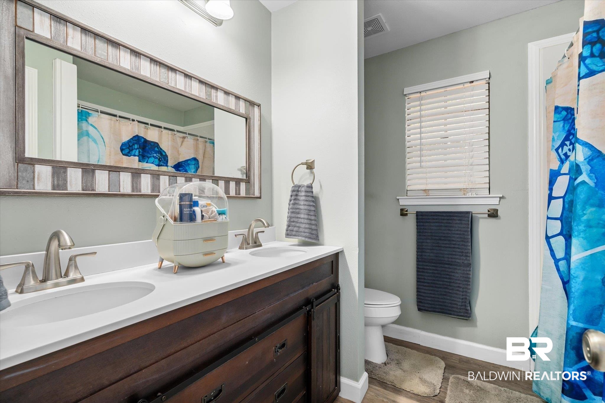 9987 Downing Street Semmes, AL 36575 - Photo 12 of 20 Bathroom with toilet, vanity, and wood-type flooring