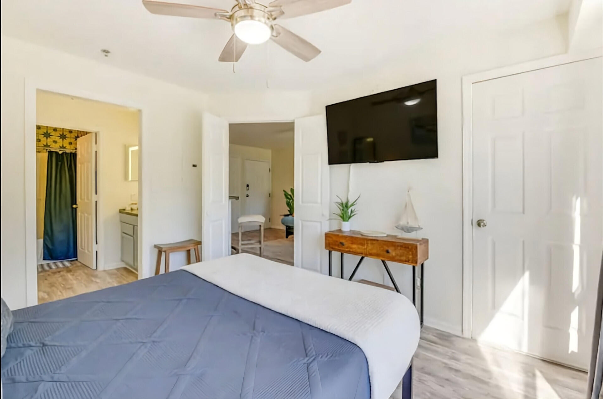 200 Sandestin Lane, Unit 616 Miramar Beach, FL 32550 - Photo 17 of 30 a bedroom with a bed and a flat screen tv