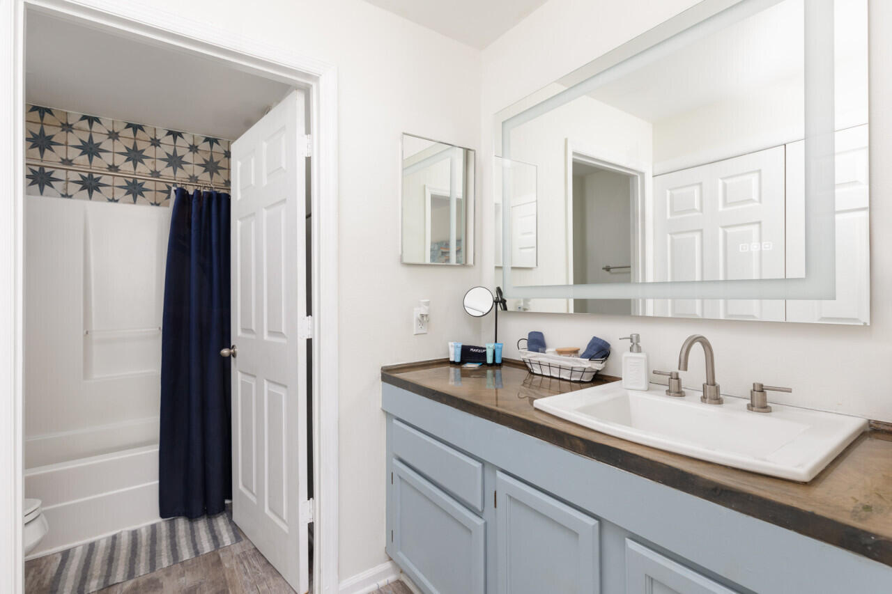 200 Sandestin Lane, Unit 616 Miramar Beach, FL 32550 - Photo 21 of 30 a bathroom with a sink and a mirror