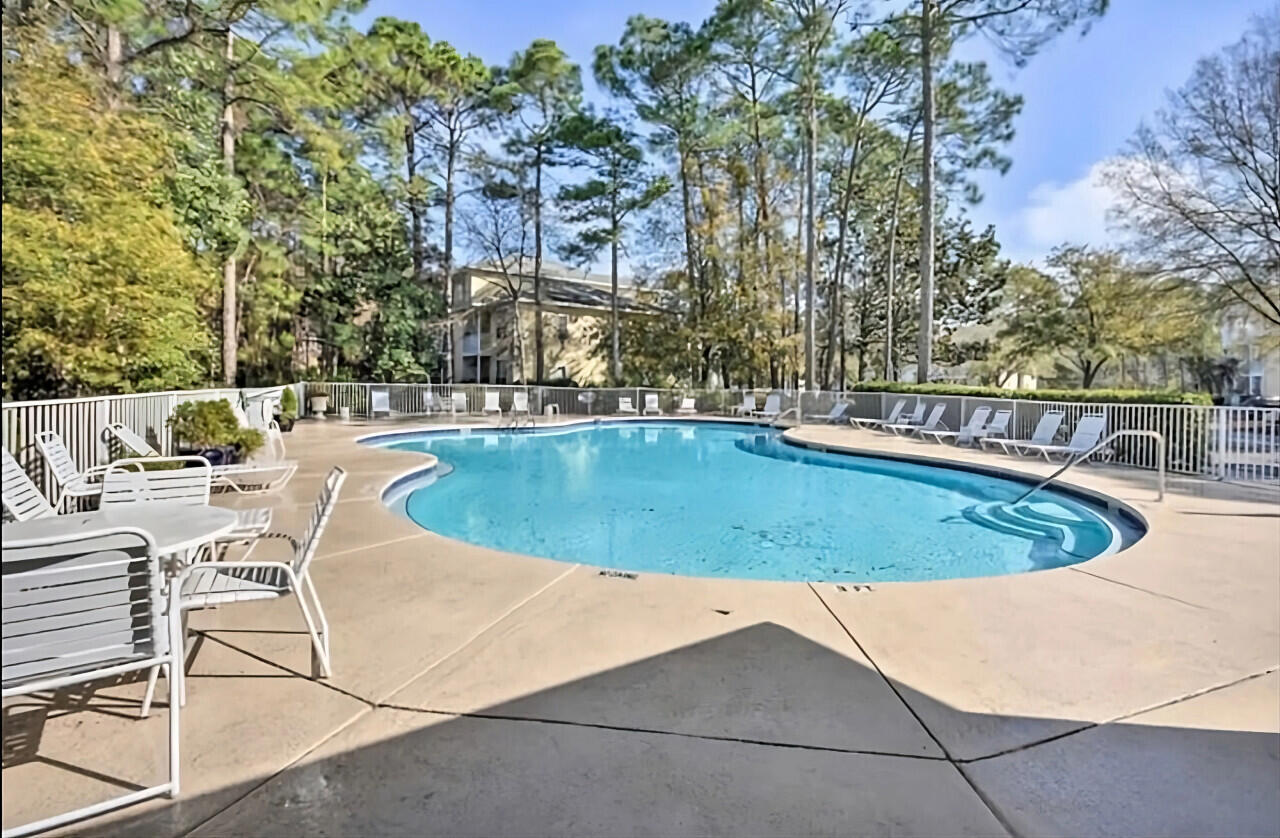 200 Sandestin Lane, Unit 616 Miramar Beach, FL 32550 - Photo 24 of 30 a view of a swimming pool with outdoor seating