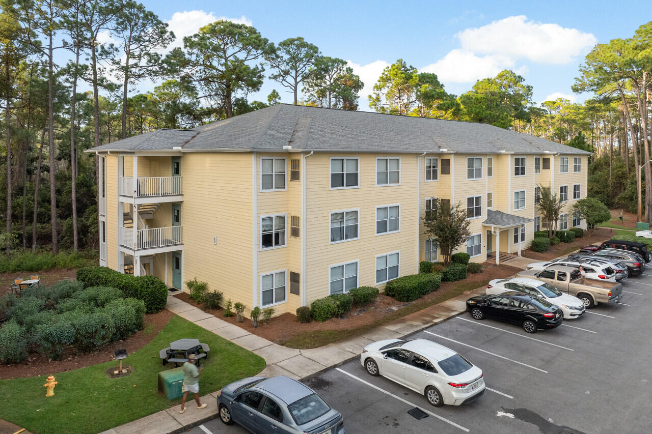 200 Sandestin Lane, Unit 616 Miramar Beach, FL 32550 - Photo 5 of 30 a car parked in front of a white house