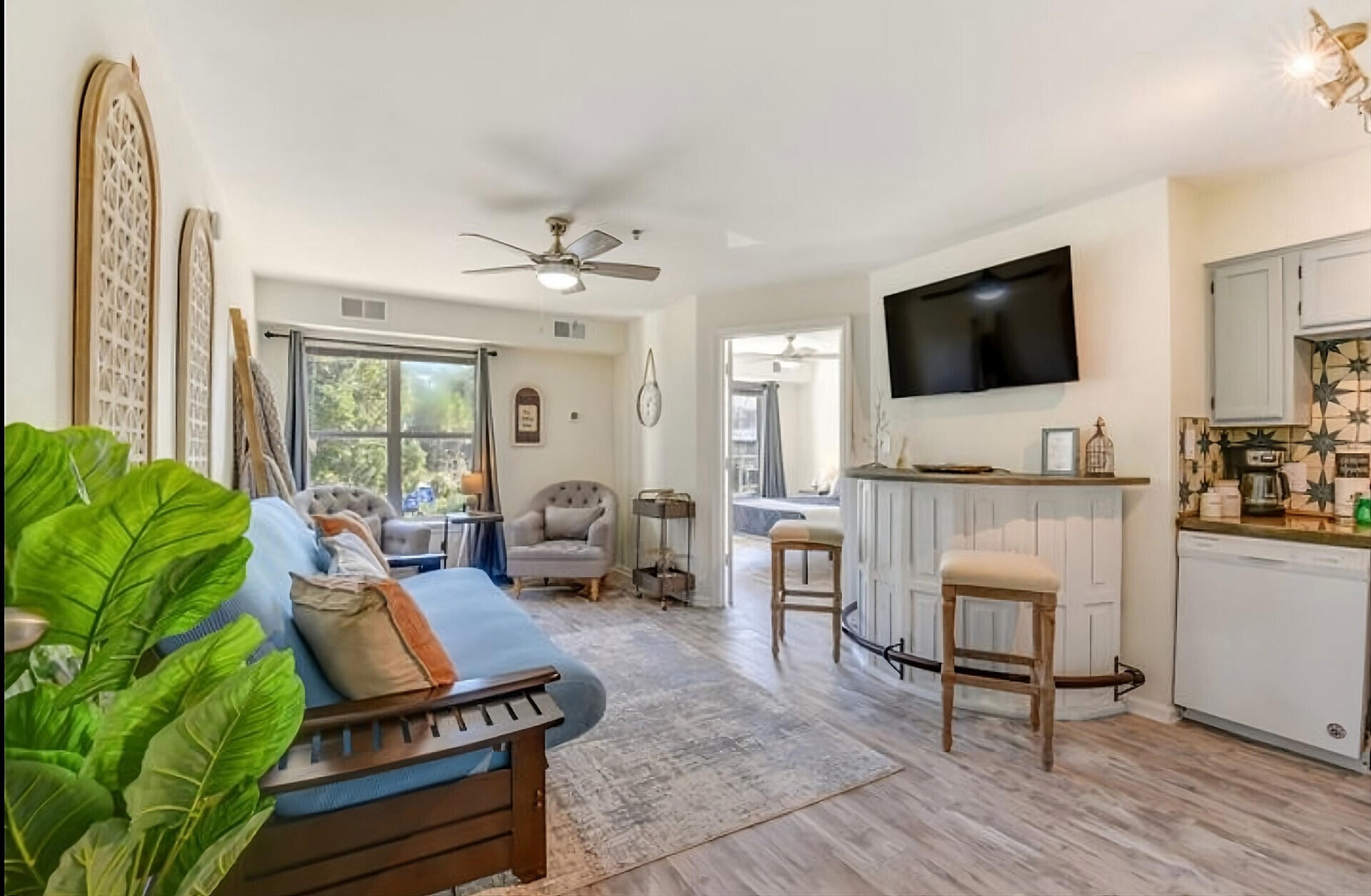 200 Sandestin Lane, Unit 616 Miramar Beach, FL 32550 - Photo 8 of 30 a living room with furniture and a flat screen tv