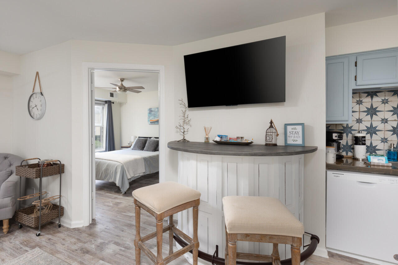 200 Sandestin Lane, Unit 616 Miramar Beach, FL 32550 - Photo 9 of 30 a living room with furniture and a flat screen tv