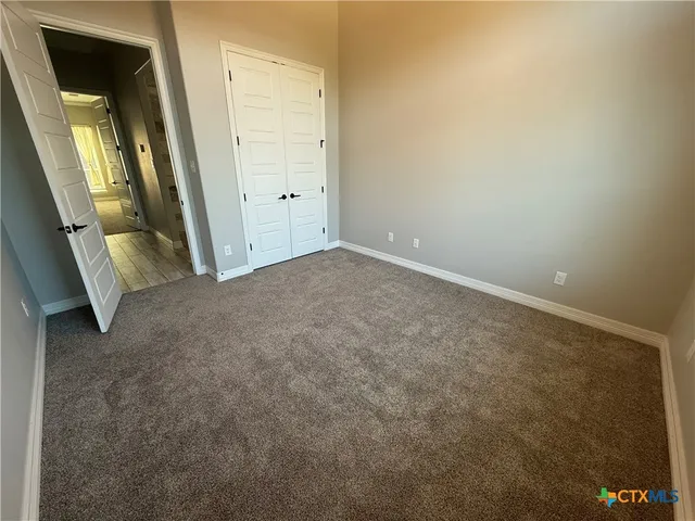 an empty room with window