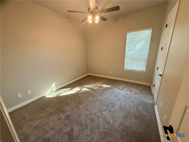 a view of empty room with window