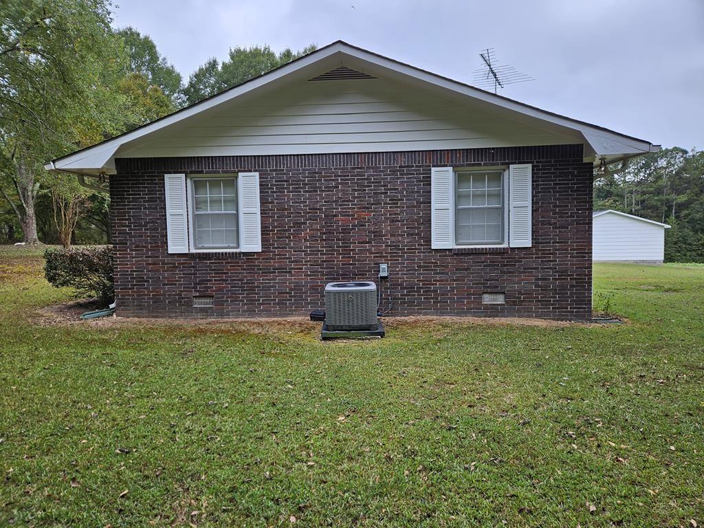 306 Grady Whitton Road Bremen, GA 30110 - Photo 11 of 48 a front view of a house with a yard