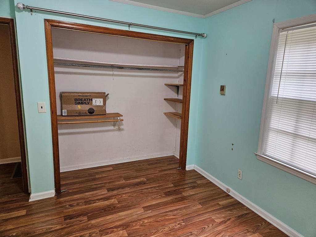 306 Grady Whitton Road Bremen, GA 30110 - Photo 40 of 48 a view of empty room with window and wooden floor