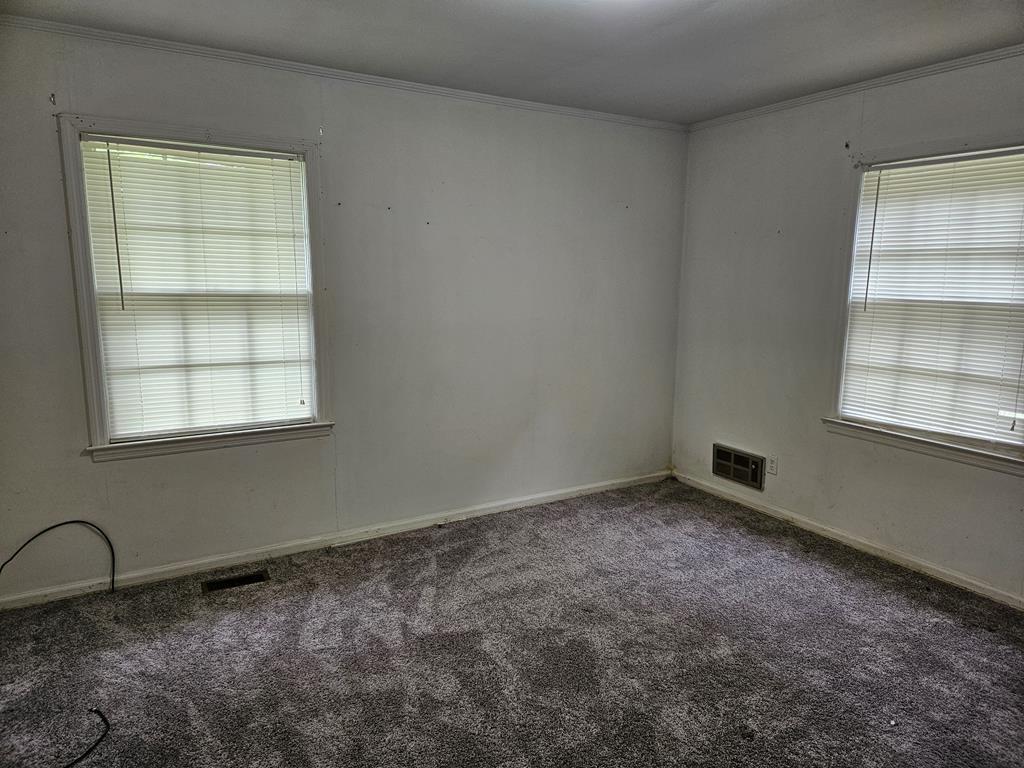 306 Grady Whitton Road Bremen, GA 30110 - Photo 43 of 48 an empty room with a window