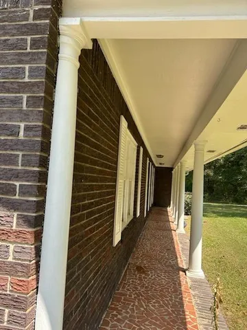 a view of hallway with stairs
