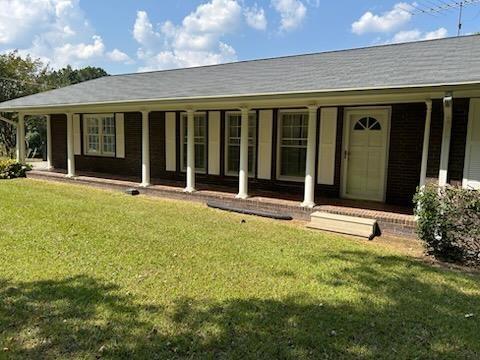 306 Grady Whitton Road Bremen, GA 30110 - Photo 8 of 48 front view of a house with a large window and plants