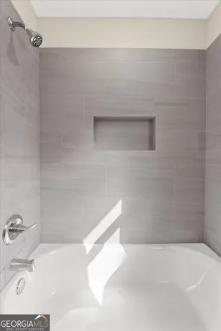 a bathroom with a bathtub