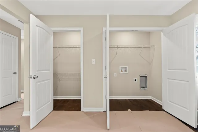 a bathroom with a tub and shower