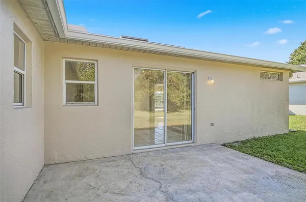 view of an empty room with a window