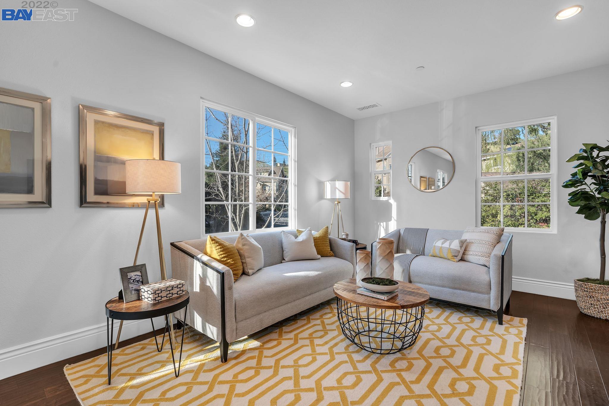 2506 Monet Terrace Fremont, CA 94539 - Photo 1 of 1 a living room with furniture and a large window