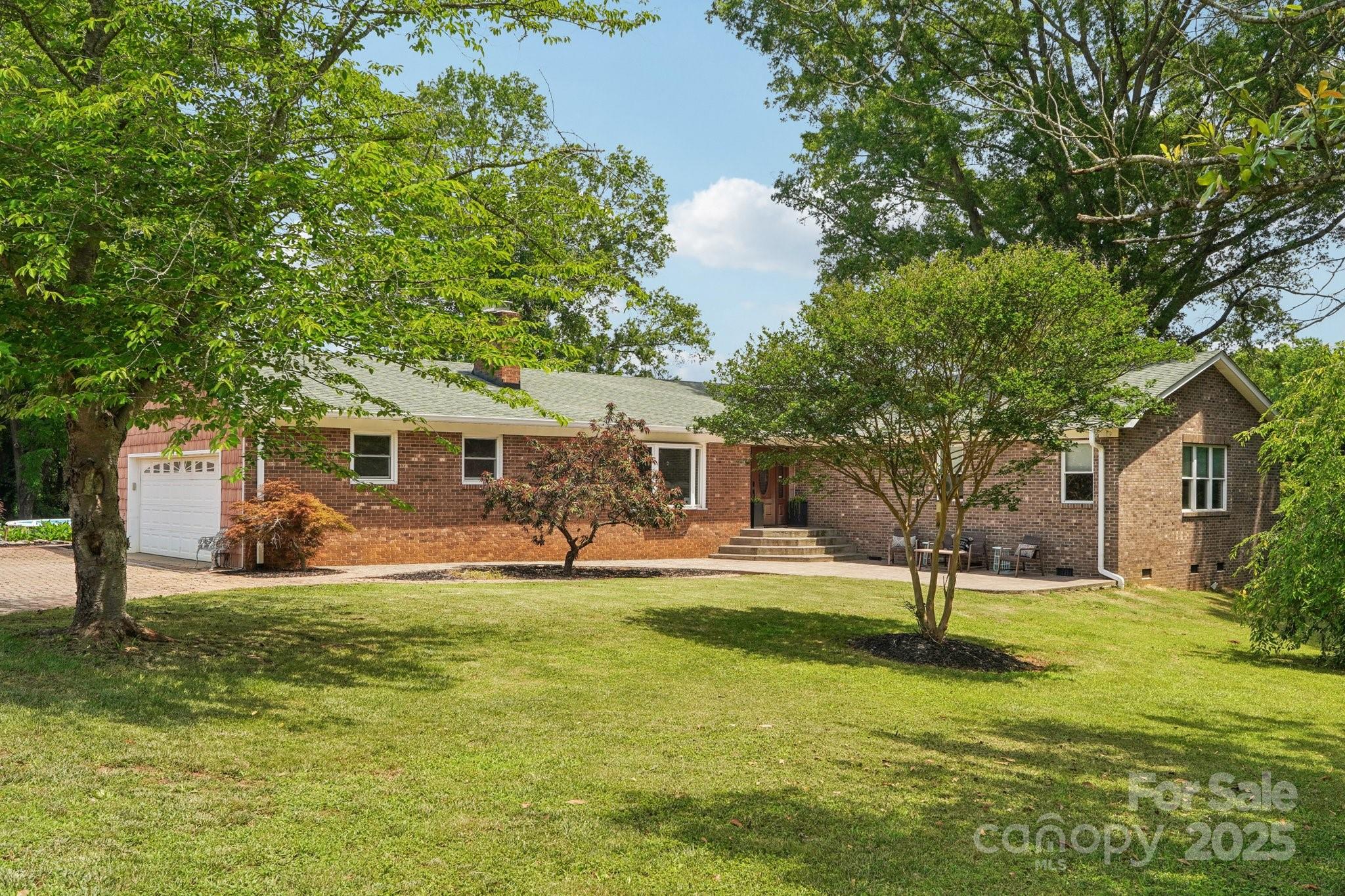 327 Johnson Dairy Road Mooresville, NC 28115 - Photo 1 of 36 a front view of house with yard and tree