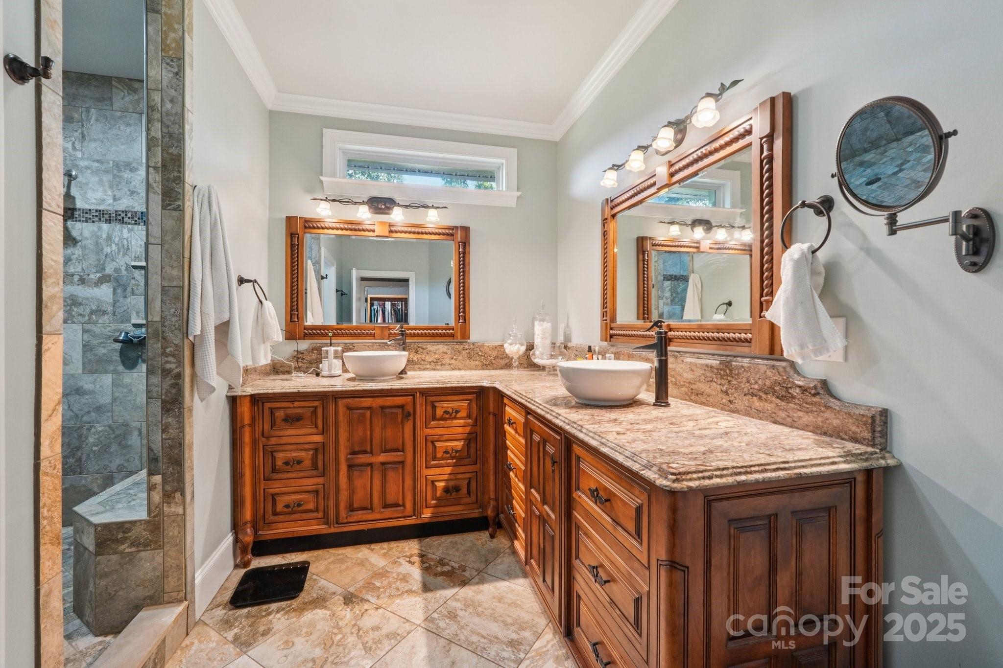 327 Johnson Dairy Road Mooresville, NC 28115 - Photo 14 of 36 a bathroom with a granite countertop double vanity sink a mirror and a shower