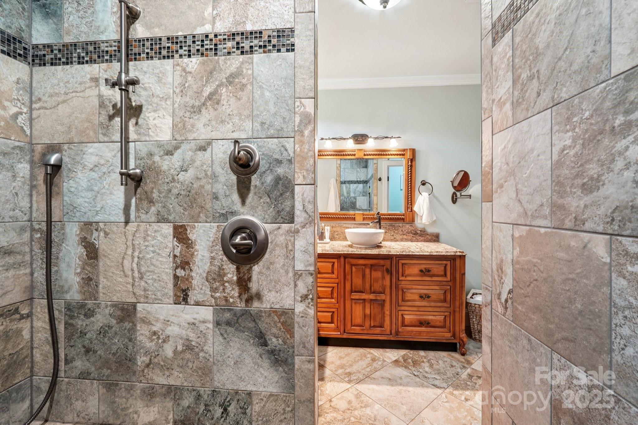 327 Johnson Dairy Road Mooresville, NC 28115 - Photo 15 of 36 a bathroom with a granite countertop shower a mirror and sink