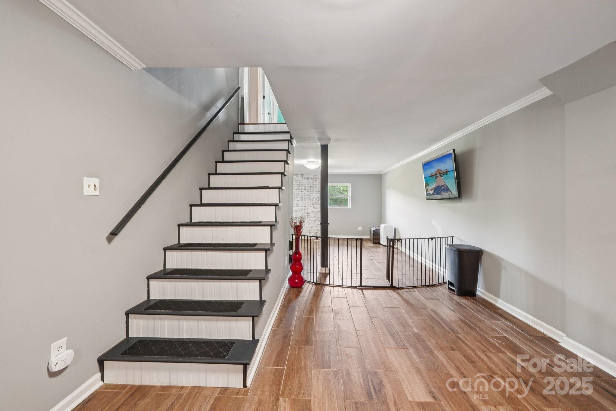 327 Johnson Dairy Road Mooresville, NC 28115 - Photo 22 of 36 a view of entryway and hall with wooden floor