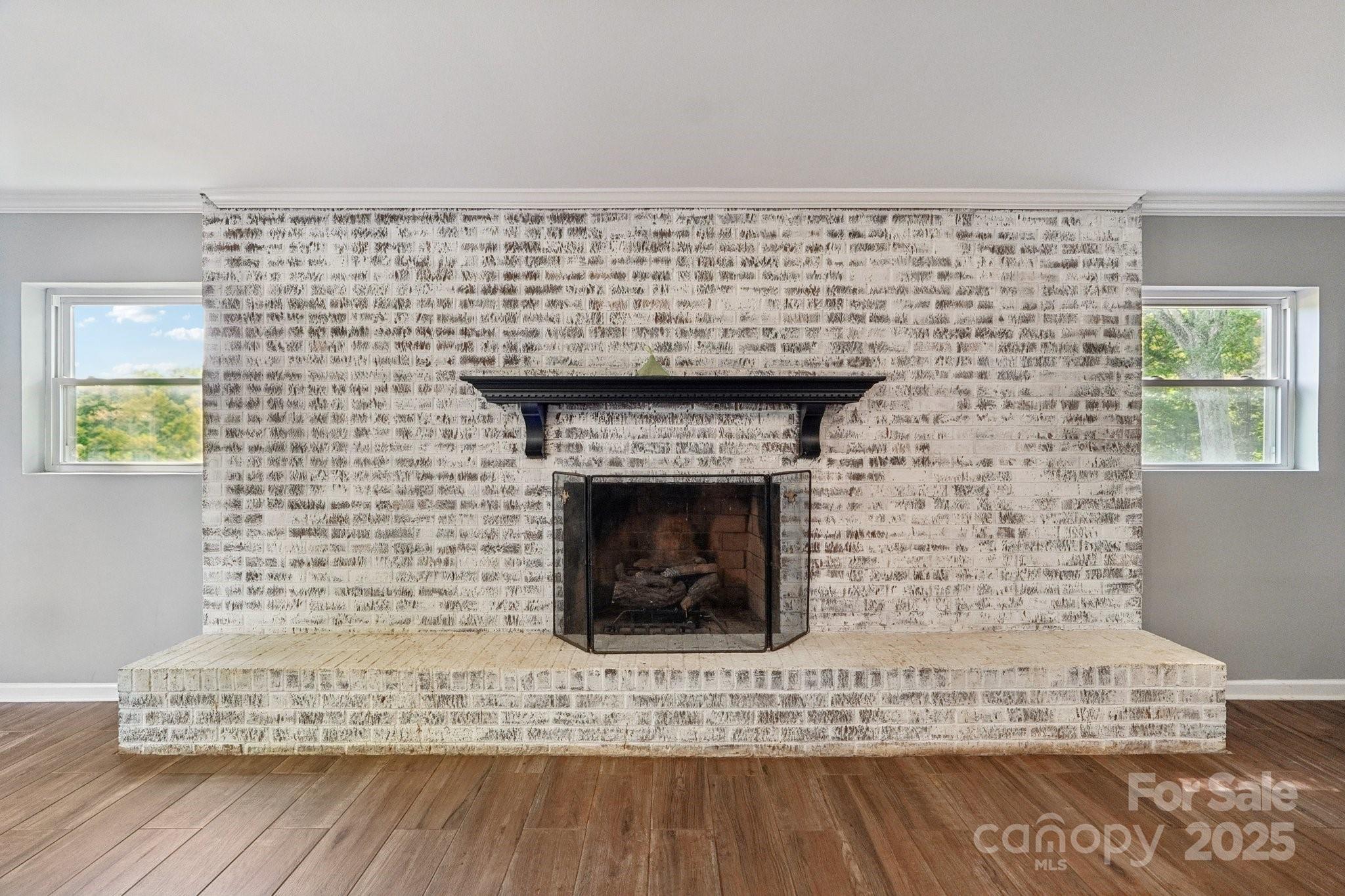 327 Johnson Dairy Road Mooresville, NC 28115 - Photo 26 of 36 a living room with a fireplace