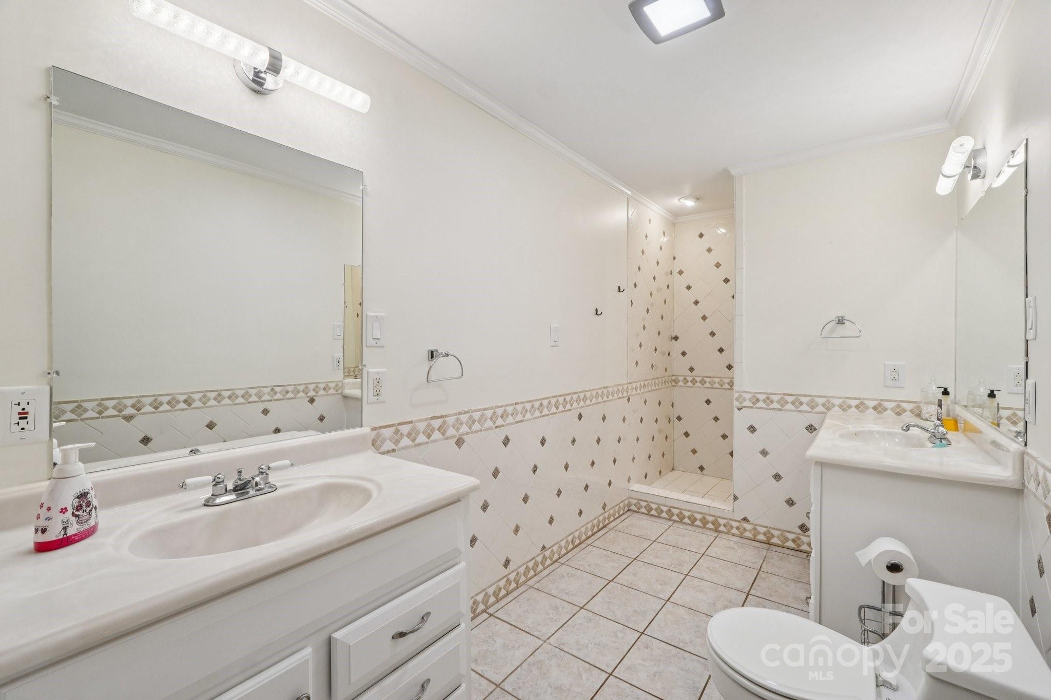 327 Johnson Dairy Road Mooresville, NC 28115 - Photo 29 of 36 a bathroom with a sink toilet and shower