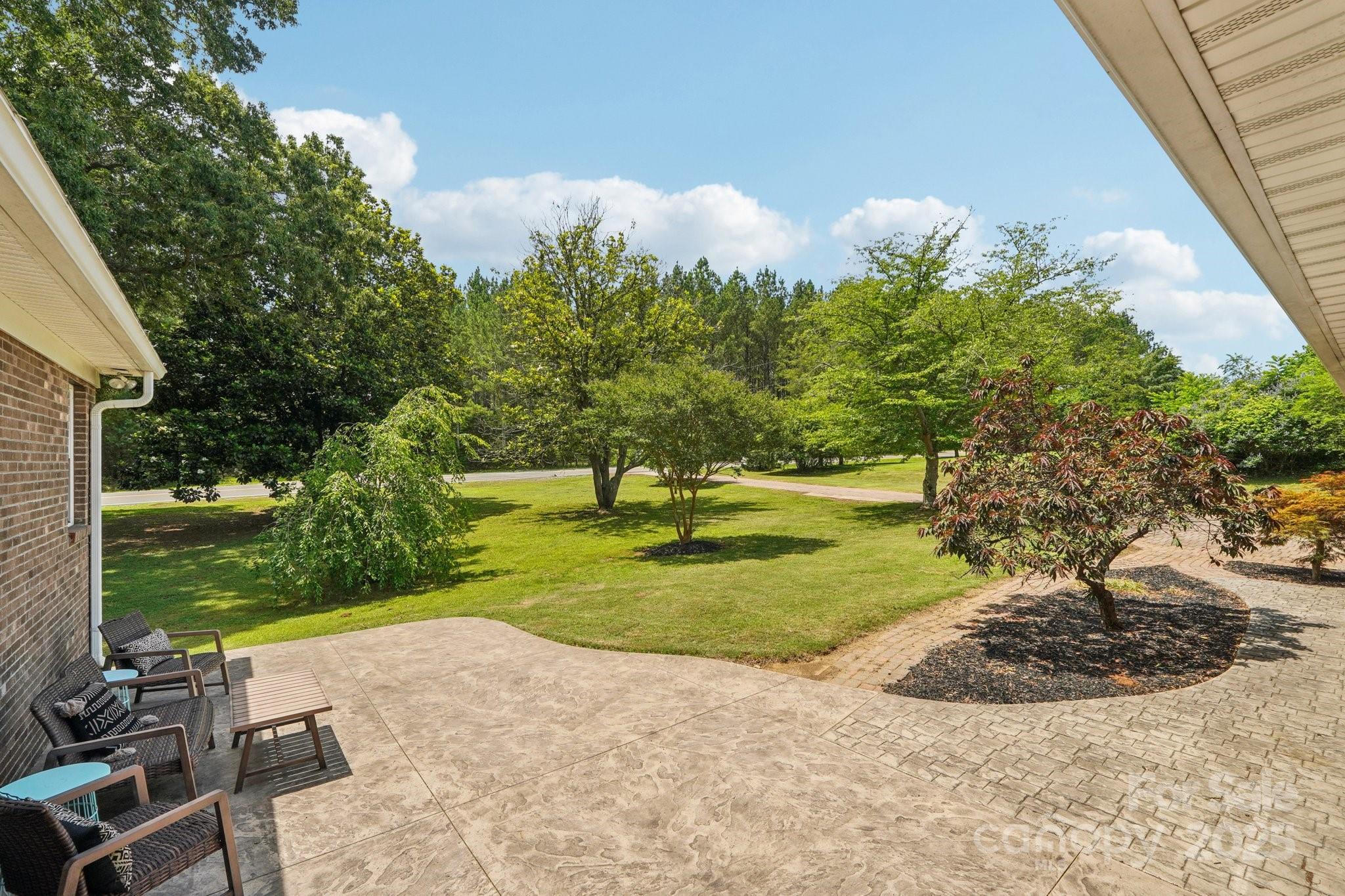 327 Johnson Dairy Road Mooresville, NC 28115 - Photo 4 of 36 a view of a park with large trees