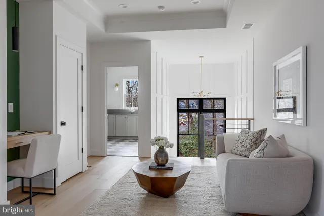 a living room with furniture and window