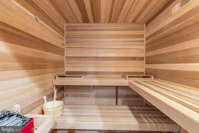 a view of a porch with wooden floor and fence
