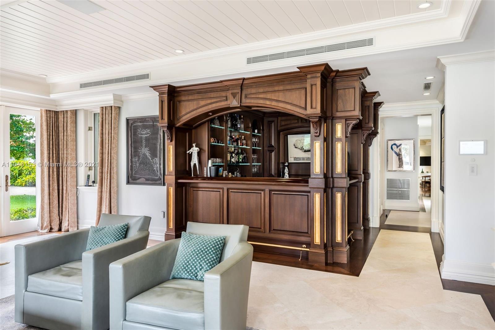 6385 Pine Tree Dr Circle Miami Beach, FL 33140 - Photo 11 of 37 a living room with furniture