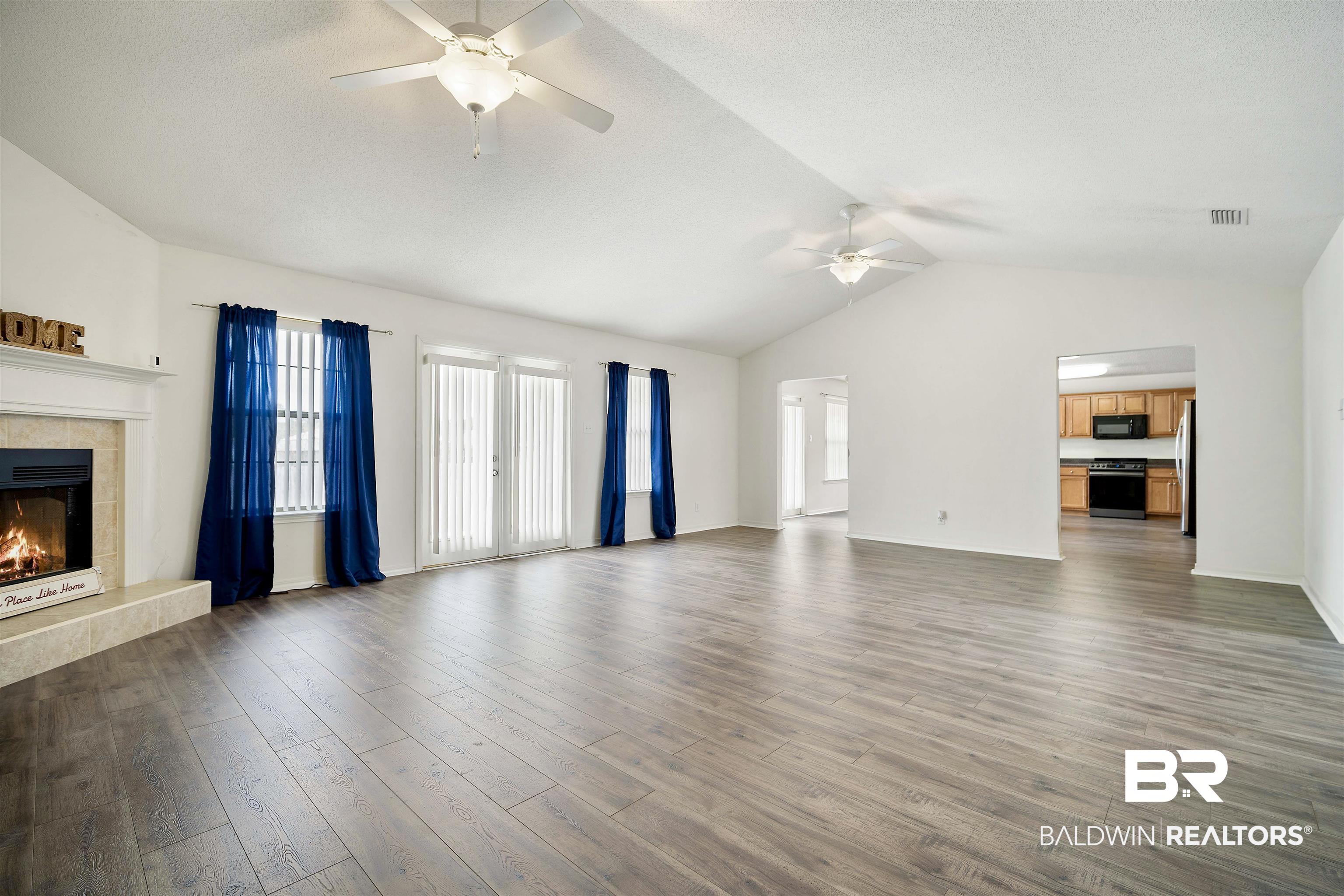 10692 Middle Oak Drive Mobile, AL 36695 - Photo 7 of 27 Large living room with gas log fireplace!