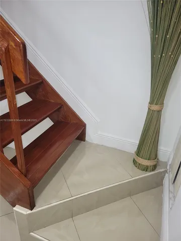 a bathroom with a sink a mirror and a bathtub