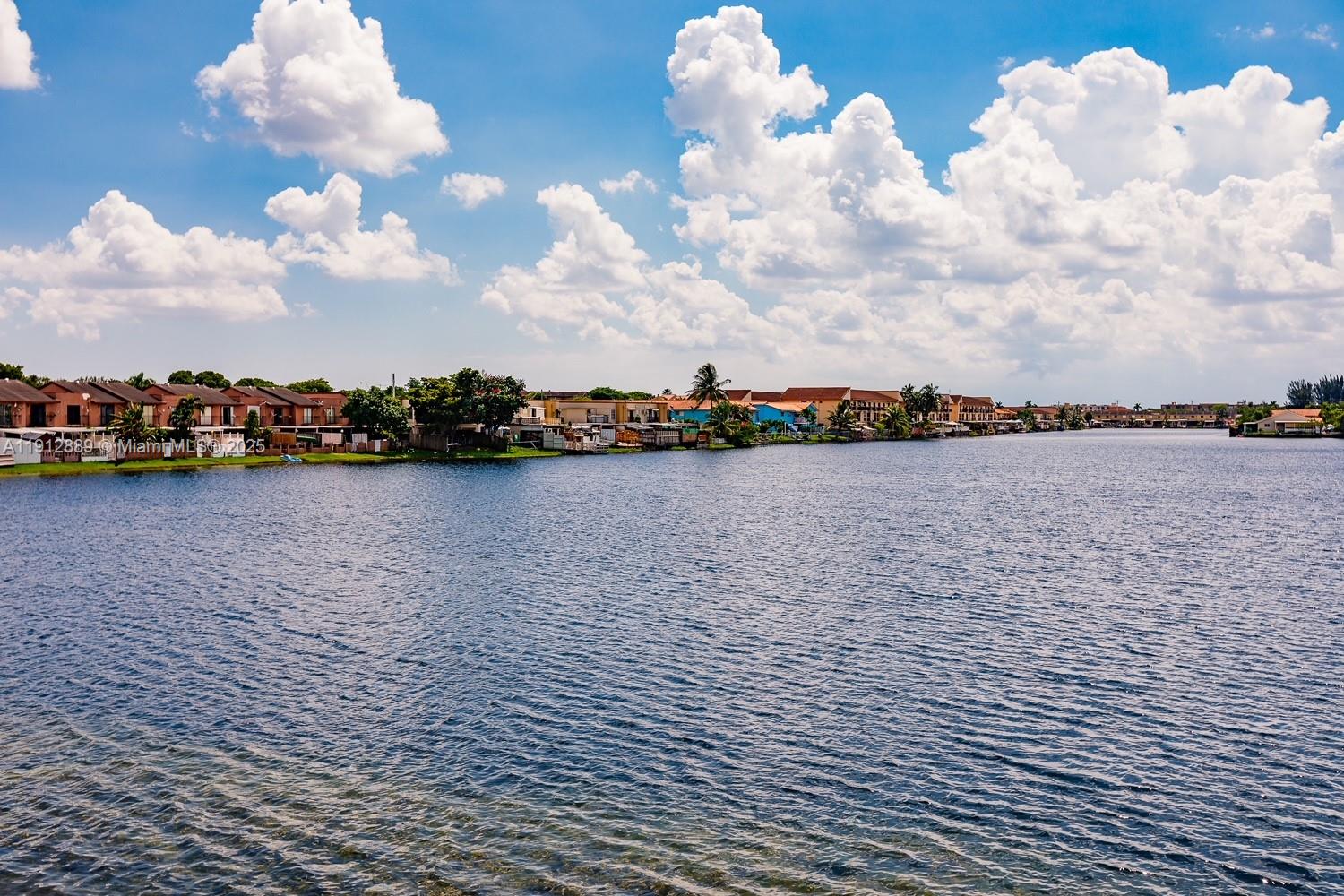 2670 West 60th Street, Unit 90 Hialeah, FL 33016 - Photo 25 of 26 a view of outside space yard and mountain view
