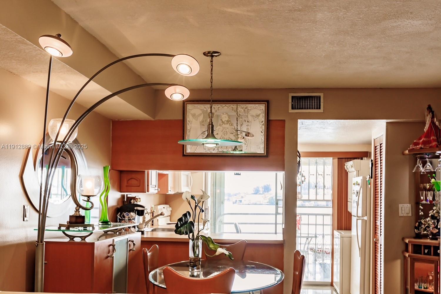 2670 West 60th Street, Unit 90 Hialeah, FL 33016 - Photo 6 of 26 a room with musical instrument pool table and windows