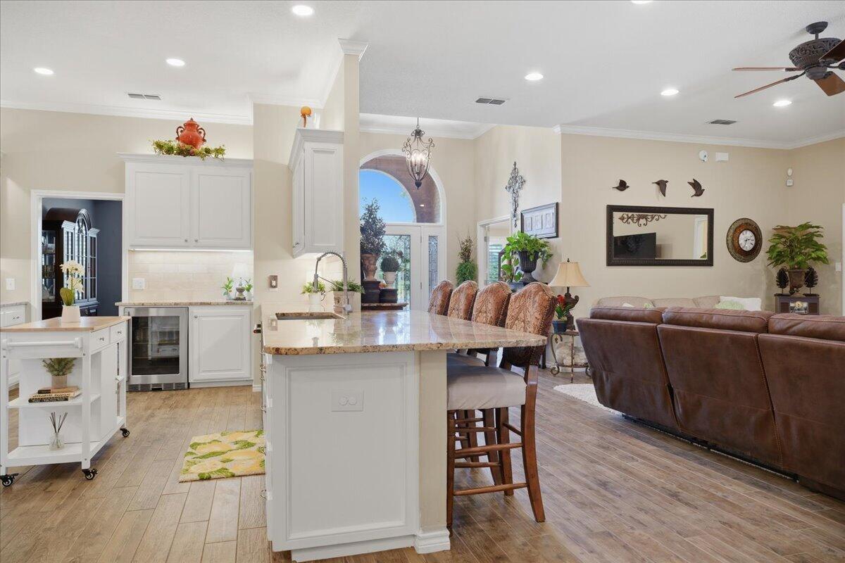 4612 100th Street Lubbock, TX 79424 - Photo 25 of 55 a kitchen with stainless steel appliances kitchen island granite countertop a sink and cabinets