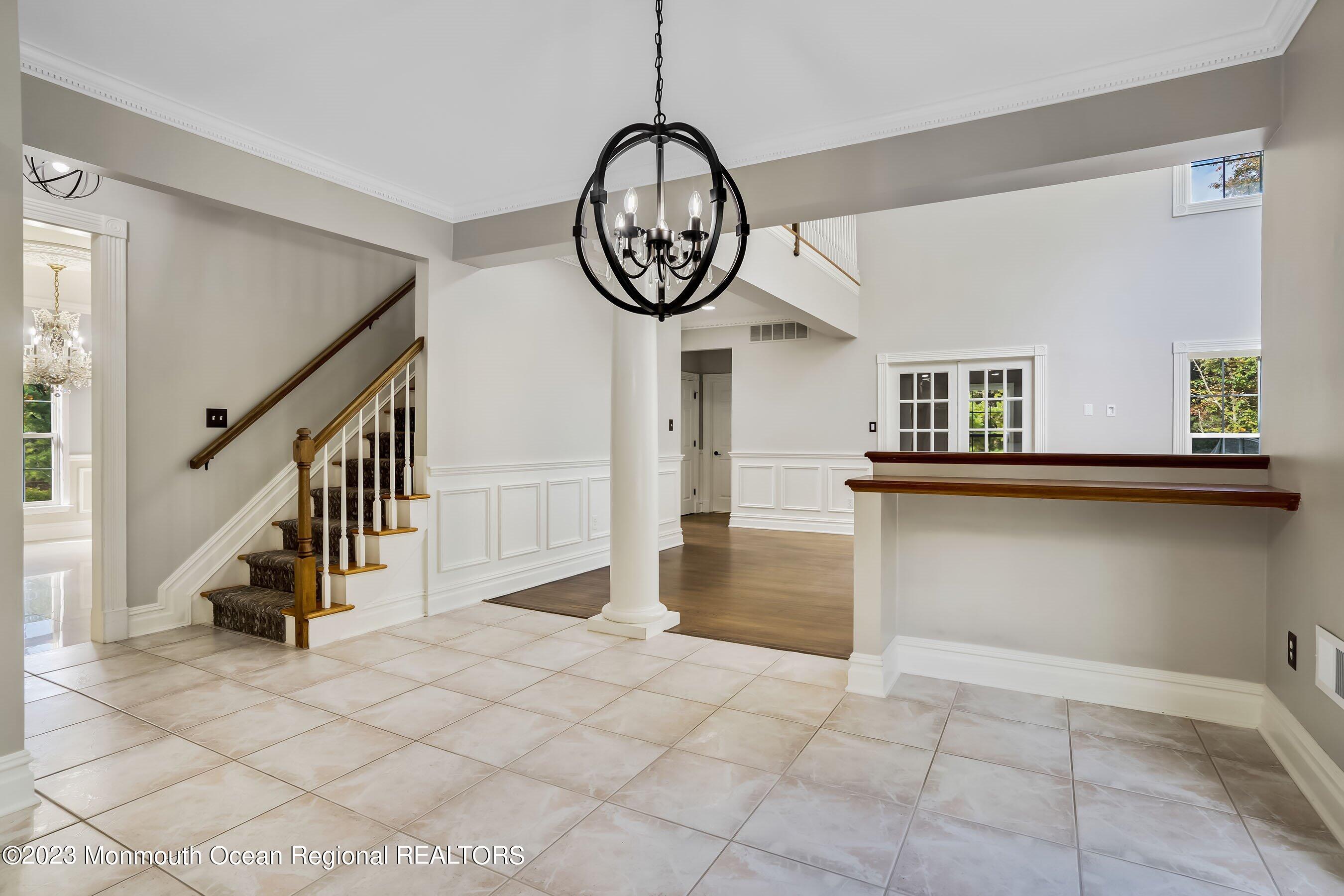3 Copperleaf Lane Colts Neck, NJ 07722 - Photo 22 of 47 a view of an entryway with wooden floor