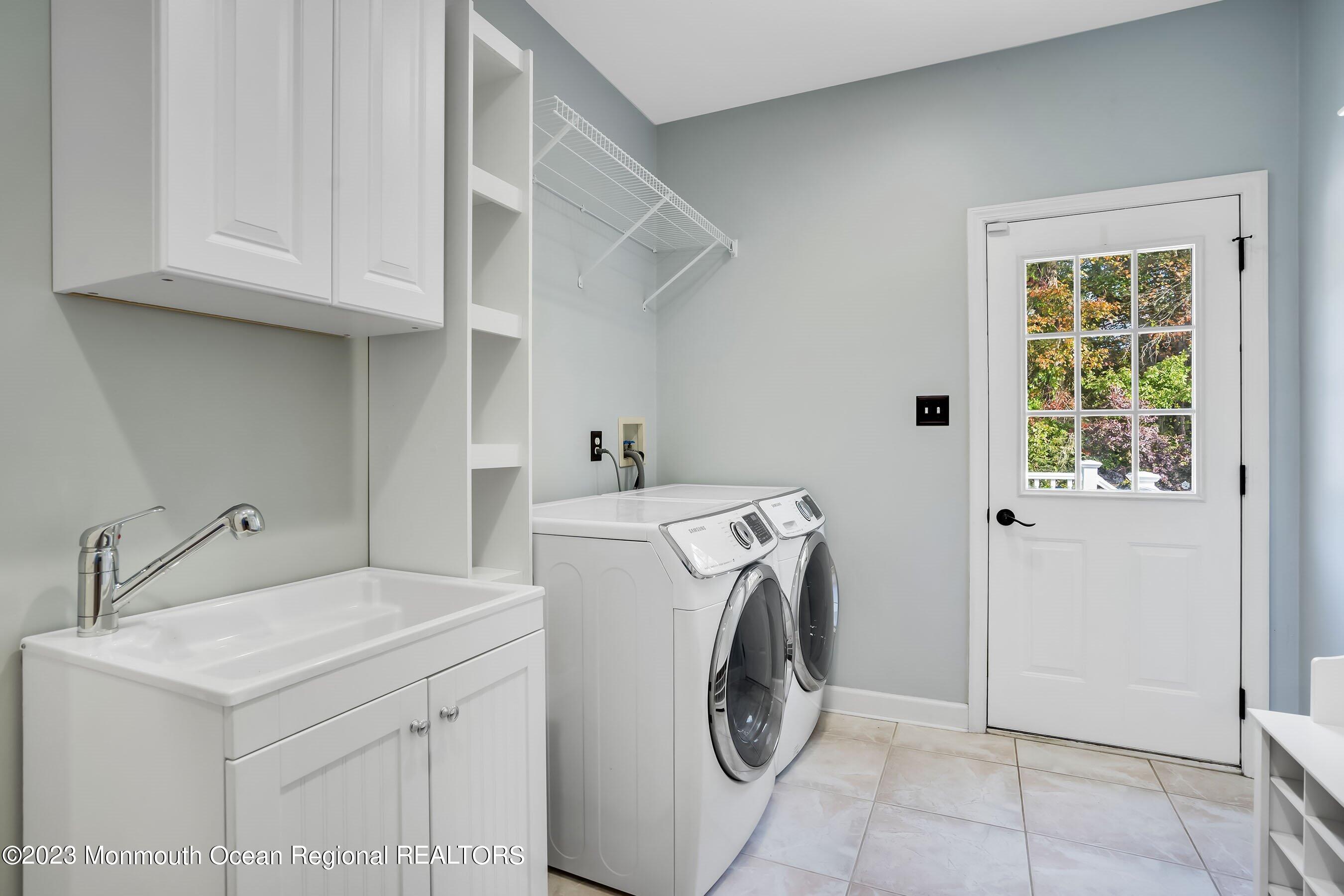 3 Copperleaf Lane Colts Neck, NJ 07722 - Photo 24 of 47 a utility room with dryer and washer
