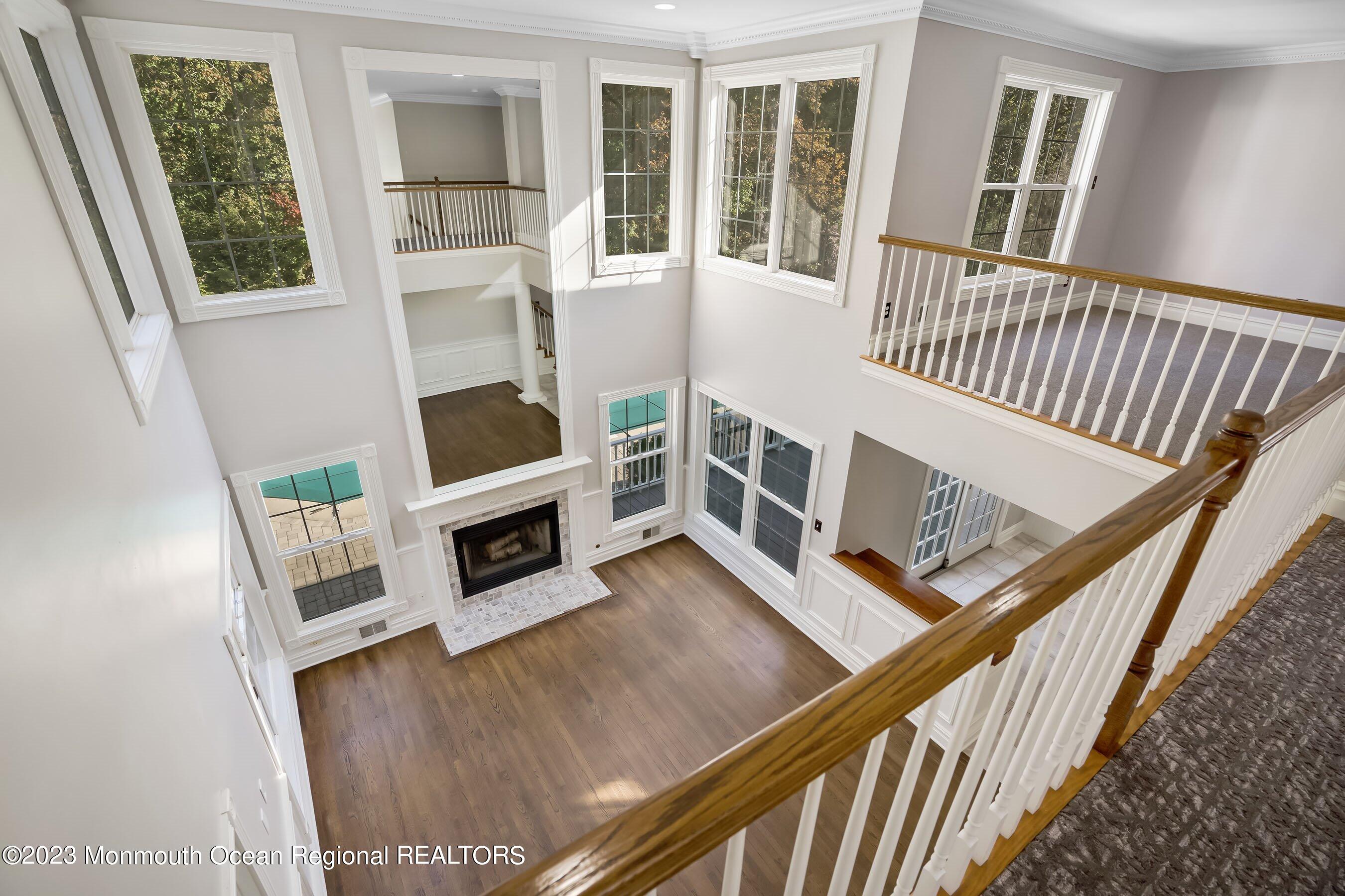 3 Copperleaf Lane Colts Neck, NJ 07722 - Photo 26 of 47 a living room with furniture and a fireplace