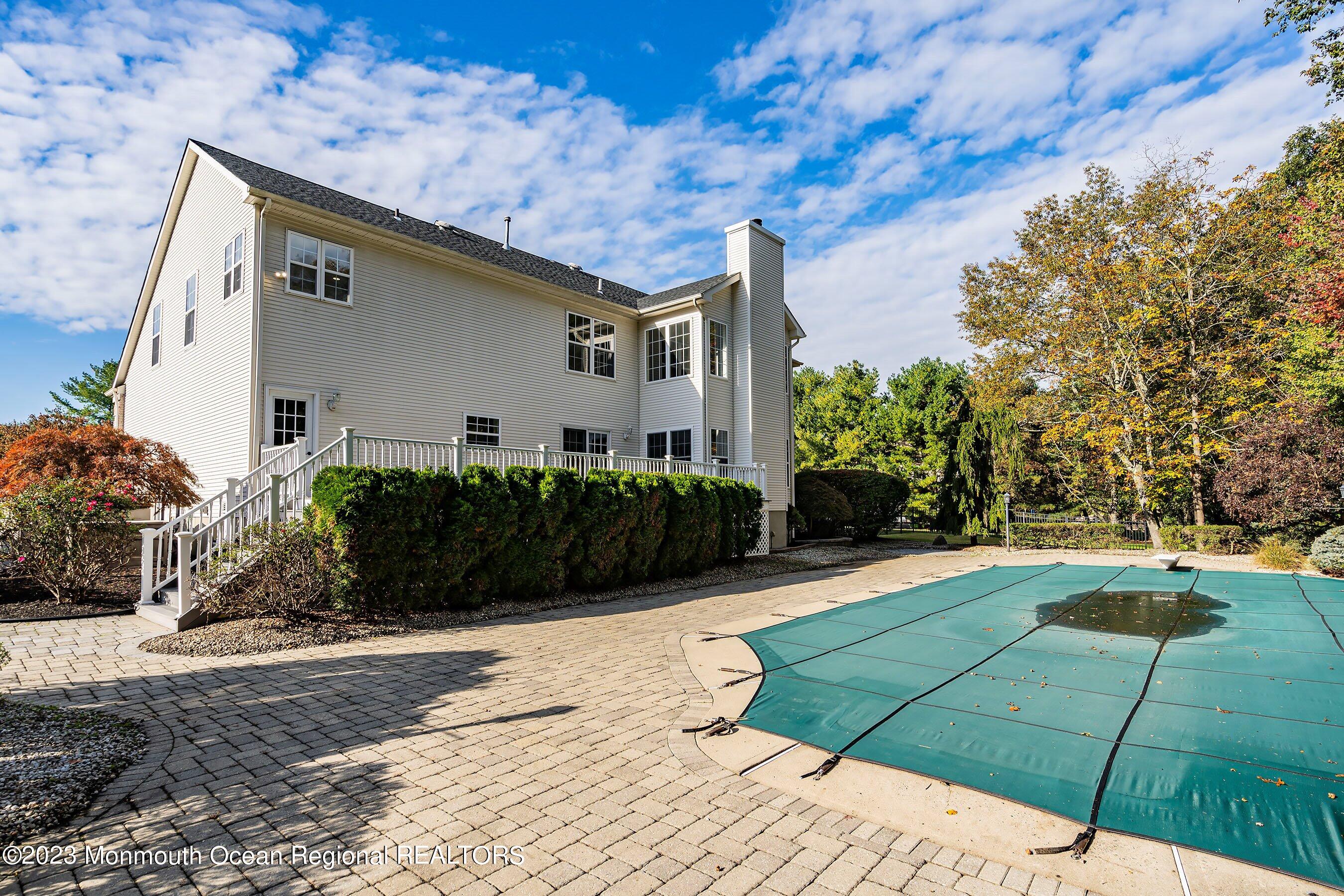 3 Copperleaf Lane Colts Neck, NJ 07722 - Photo 41 of 47 a front view of a house with a yard
