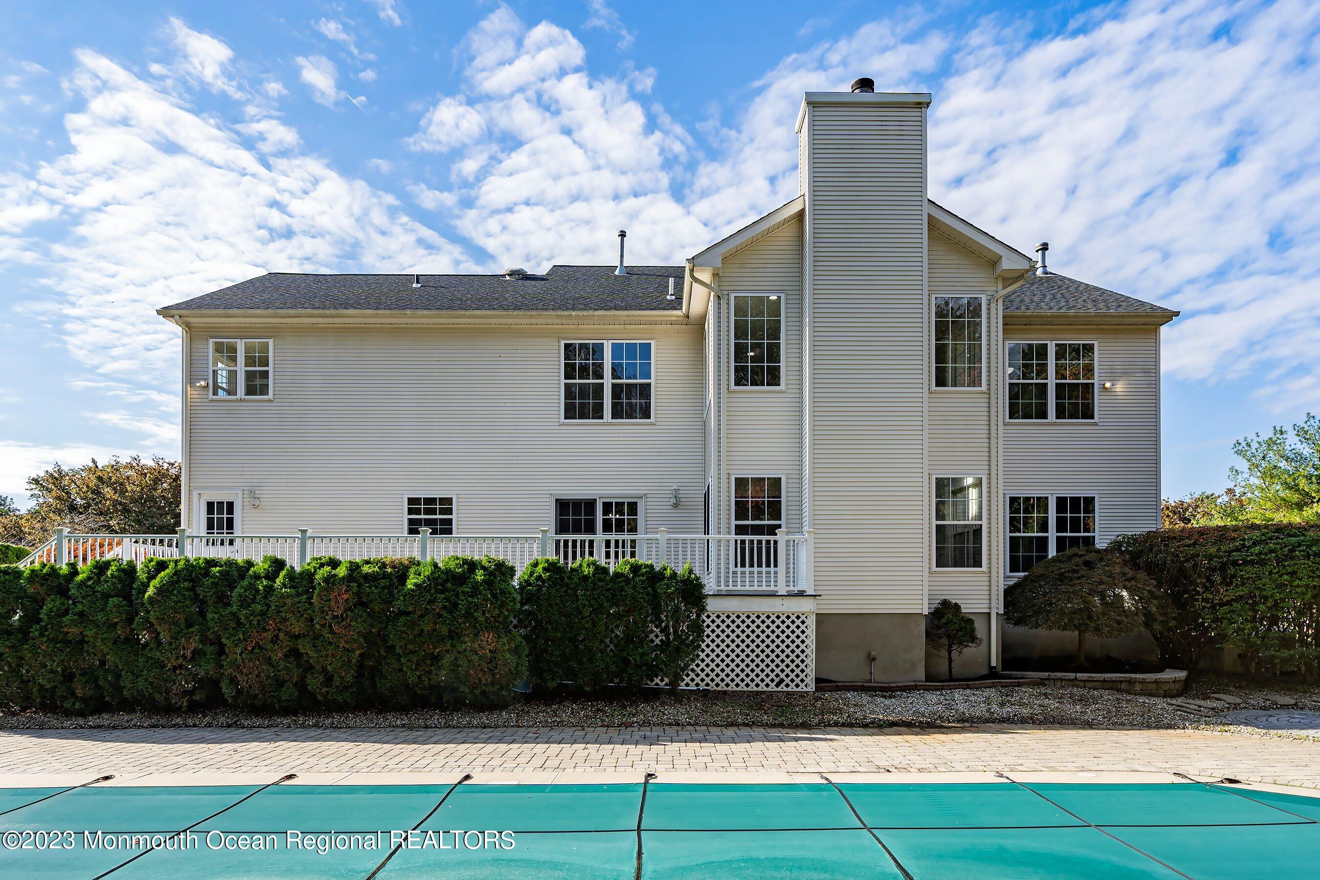 3 Copperleaf Lane Colts Neck, NJ 07722 - Photo 43 of 47 a front view of a house with a yard