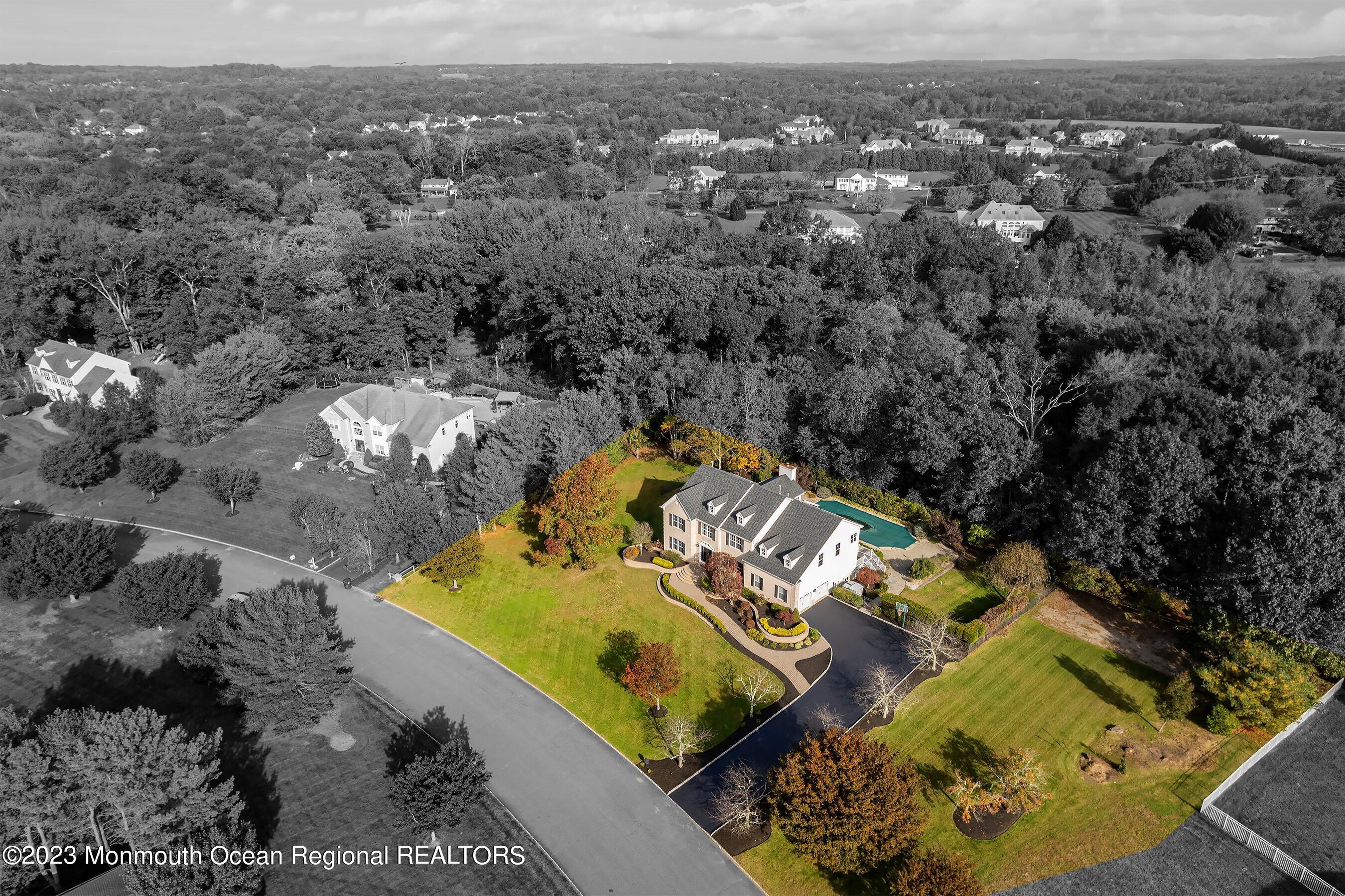 3 Copperleaf Lane Colts Neck, NJ 07722 - Photo 47 of 47 an aerial view of a house with a swimming pool